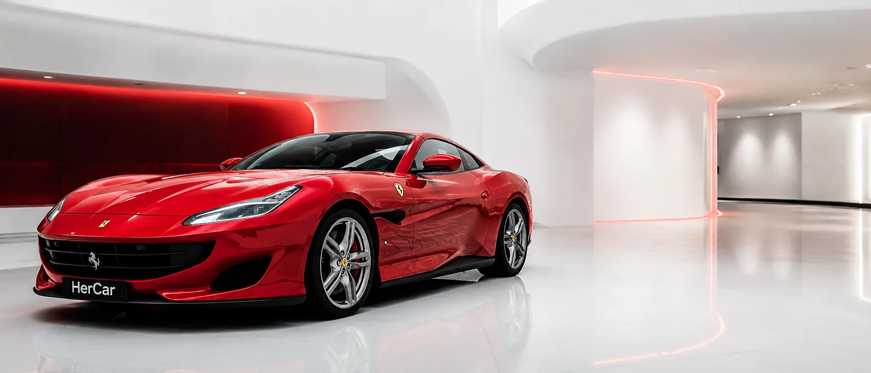 Red sports car in the HerCar showroom